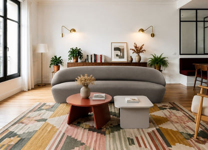 Dreisitzer-Sofa NAIVE von EMKO in einem modern eingerichteten Wohnzimmer