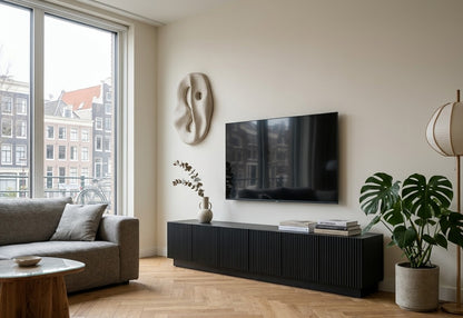 TV-Sideboard RIFF 218 cm schwarz gebeizt des Herstellers Radis in einem hellen Wohnzimmer 